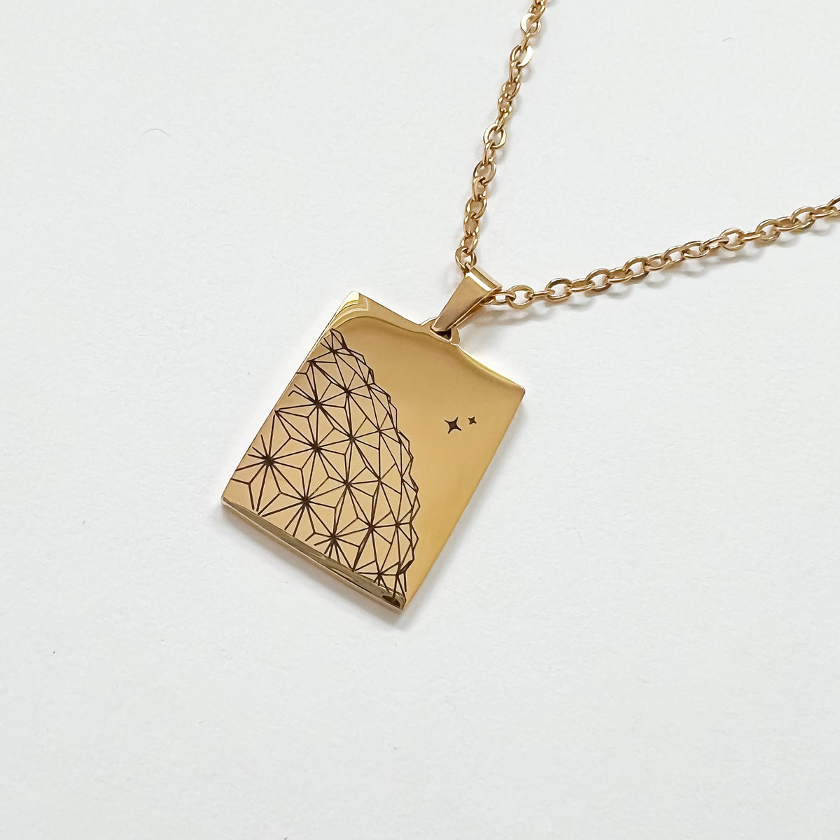 Gold sales spaceship pendant