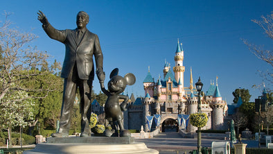 Partner statue with Disneyland Sleeping Beauty Castle. 